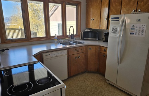 Campbellton House | Solarium overlooking city, river and mountains. Sometimes Northern lights.