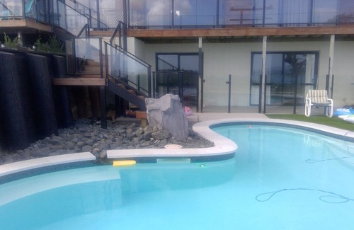 Doubtless Bay Apartment | Solitude with a pool and spectacular views pet friendly