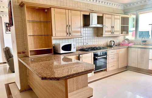 Masaki Apartment | Spacious 3-bedroom apartment in vibrant Dar es Salaam with WiFi AC Swimming pool