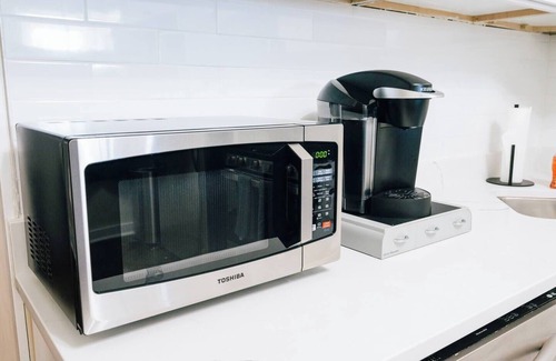 Logan Square Apartment | Spacious 3-bedroom retreat in West Logan with modern amenities, perfect for families looking to relax and explore vibrant Logan Square.