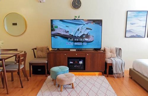 Sasa Apartment | Spacious 36sqm Studio with 65" TV Netflix Karaoke and Pool Access Near Airport and Samal Ferry