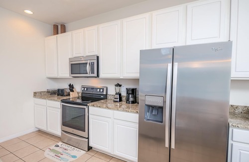 Seasons House | Spacious 4BR townhome in Kissimmee with lake views, perfect for families!