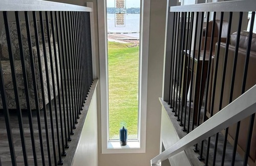 Montague House | Spacious 5-bedroom beach house in charming Roma Point with WiFi, AC