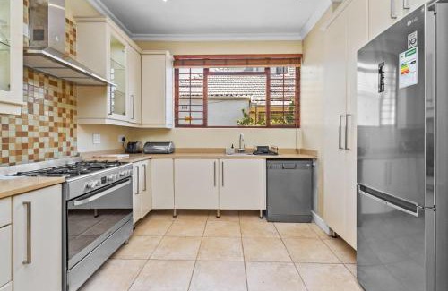 Claremont House | Spacious Claremont Home with Pool Fireplace