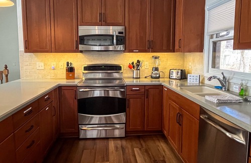 North Shore House | Spacious dog-friendly lakefront house w/dock, hot tub & putting green