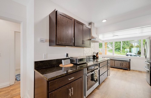 Oceanside House | Spacious ocean view home with wood fireplace, grill, & deck - dog-friendly