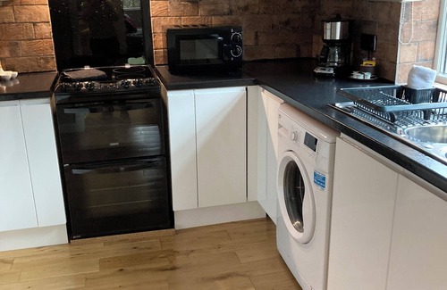 Wadsworth Apartment | Spacious Quiet Apartment with Log Burner & Patio in the Centre ofHebden Bridge .