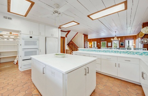 Debordieu Colony House | Spectacular Oceanfront Living with an Inviting Kitchen Perfect for Entertaining Kitchens Beach House