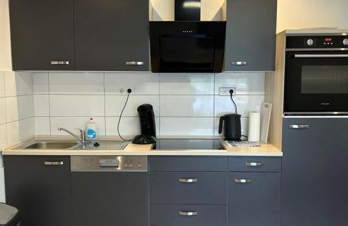 Liesborn Apartment | Stay Nest Komfort Ferien- und Monteurwohnungen Küche-Garten