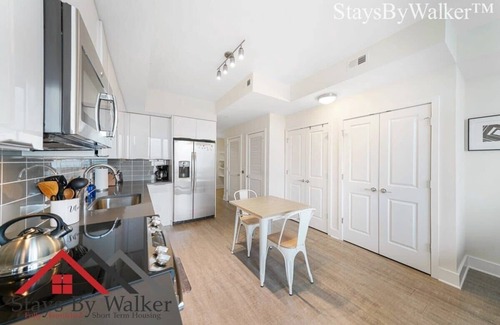 Charlotte Center City Condo | StaysByWalker Studio-King Bed! Roof Top Pool! Gym!