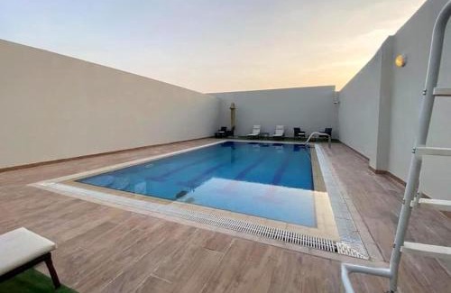 Dubai Apartment | StayShort - Dubai South Studio for 2 with Swimming Pool