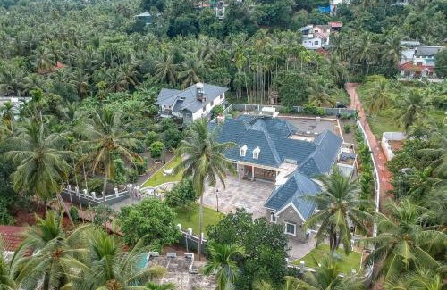 Kozhikode Villa | StayVista at The Stone Villa with Basketball Court