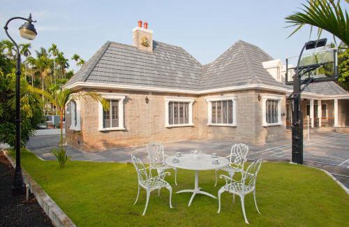 Kozhikode Villa | StayVista at The Stone Villa with Basketball Court