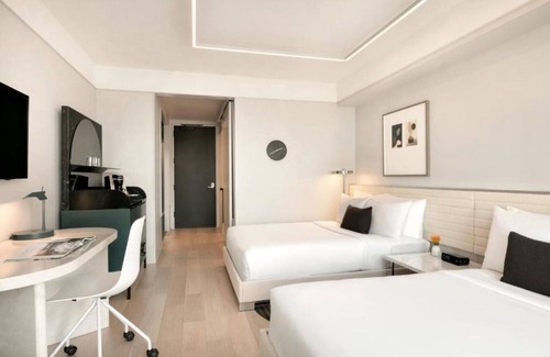 Williamsburg House | Step into our vibrant room located among the charming residential !