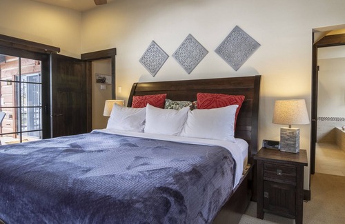 Tamarack Cottage | Stone Fireplace | Private Hot Tub | Mountain Views & Ski Access