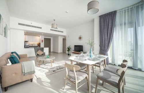Dubai Investment Park Apartment | StoneTree - Furnished 2BR with floor-to-ceiling window