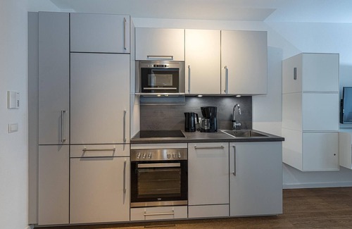 Bensersiel Apartment | Strandnahes Ferienapartment mit Balkon, Parkplatz, Schwimmbad- & Saunanutzung