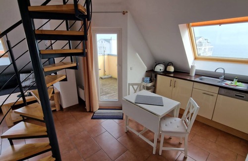 Grossenbrode Apartment | Strandperle 16 - Cozy penthouse with roof terrace and elevator