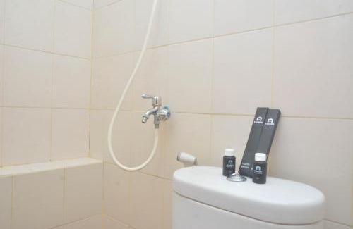 Jatinegara Apartment | Strategic and Minimalist 2BR at Bassura City Apartment By Travelio