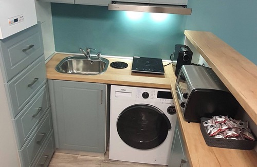 Piatra Neamt Apartment | Studio amplasat în centrul orașului cu vedere la munte.