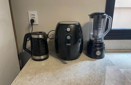 Bage Apartment | Studio Central Todo Planejado com Ar Condicionado