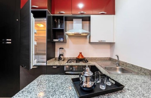 Cite Al Mohammadi Apartment | Studio Chic en Ville: Swimming pool, Wi-Fi, Parking.