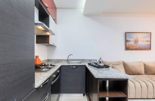 Cite Al Mohammadi Apartment | Studio Chic en Ville: Swimming pool, Wi-Fi, Parking.