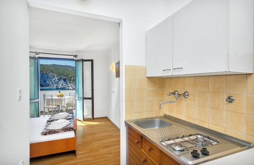 Pokrivenik Apartment | Studio flat near beach Cove Pokrivenik, Hvar (AS-5231-d)