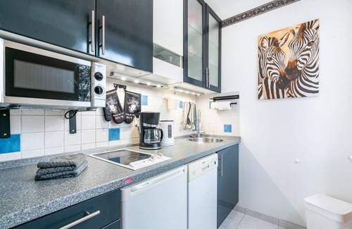 Munchen District Apartment | Studio ‘Namibia’ with balcony, parking space in front of the house and Wi-Fi