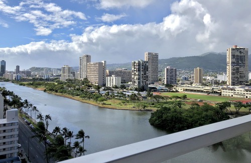 Waikiki Apartment | Studio with hardwood floors, ocean views - pool, hot tub, & sauna on-site