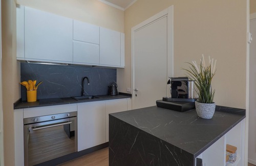 Susello Apartment | Studio with terrace and garden in a residence with pool