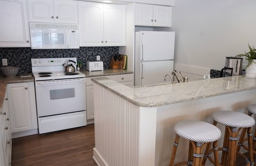 Glen Arbor Condo | Stunning Homestead Beachfront Condo - Epic Sunsets Over Sleeping Bear Bay