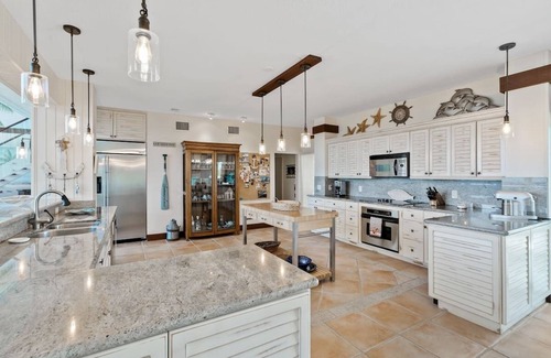 Key Largo House | Stunning property with private beach, boat dock and heated pool.