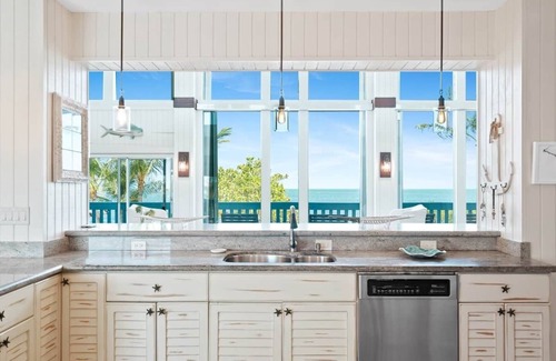 Key Largo House | Stunning property with private beach, boat dock and heated pool.
