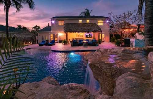 Lake Worth House | STUNNING RETREAT pool, waterfall, beach, tikis, 3 BD