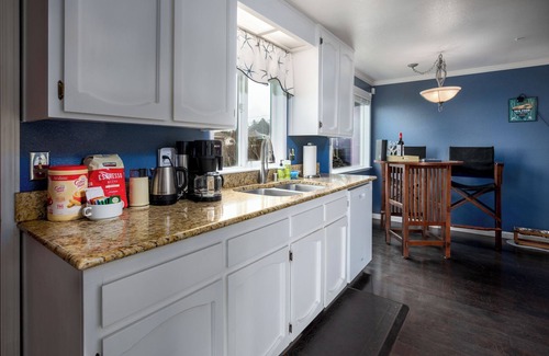Oak Harbor House | Stunningly Beautiful High Bank Waterfront Property!