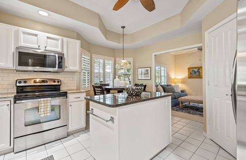 Kings Lake Condo | Stylish 1st Floor 2-bedroom condo in Kings Lake, Naples! POOL & SPA + Garage!