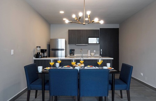Monterrey Apartment | Stylish Apartment: Pool, Gym & Mountain Scenery