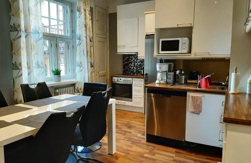 Kluuvi Apartment | Stylish city home with stunning views 76 m2