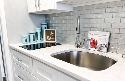 Leeds Point Condo | Stylish condo steps from the beach! Elegant blend of comfort and convenience.