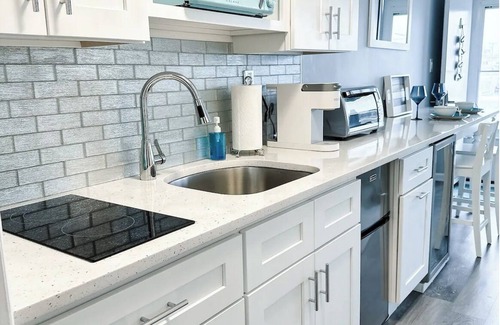 Leeds Point Condo | Stylish condo steps from the beach! Elegant blend of comfort and convenience.