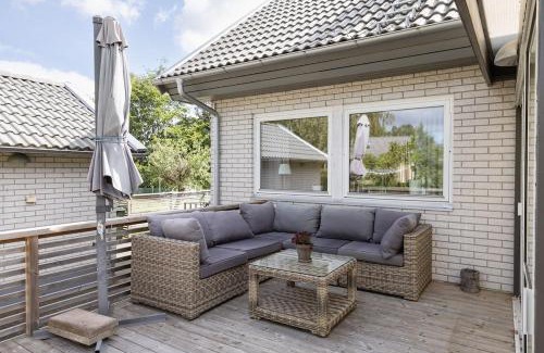 Sibbhult Villa | Stylish Family Retreat with Jacuzzi and Cinema