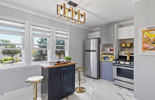 West Allis Apartment | Stylish Little Gem Upper Unit, with King Bed close to State Fair and AmFam Field