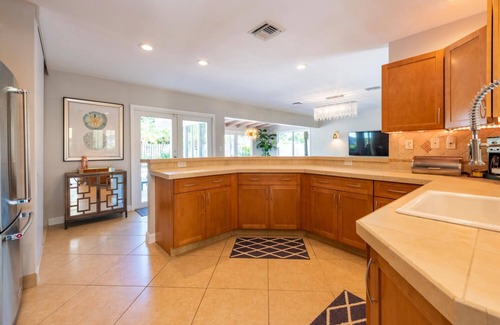 Poinsettia Heights House | Stylish Oasis with Heated Pool & King Beds Near Wilton Manors & Beach