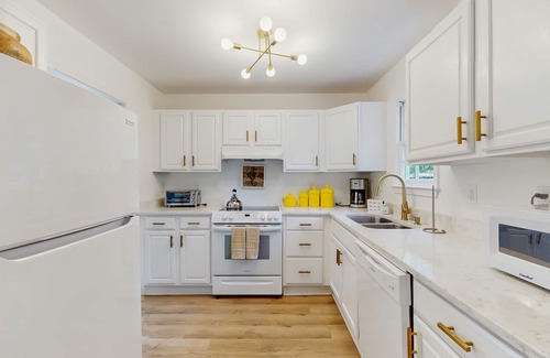 Beach Institute Hotel | Stylish southern stay with two full homes in one, quaint backyard, and walkable