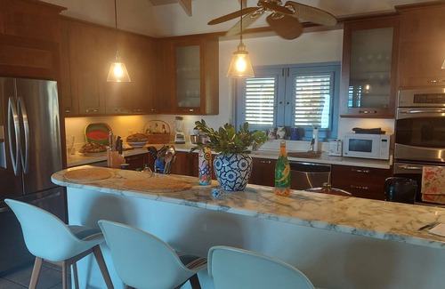 Jessups Village Villa | Stylish Villa above the golf course with great sea views 5 mins. from the beach