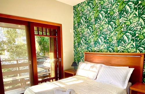 Campeche Norte House | Suíte Praia da Armação - Pousada Tulipane -Floripa