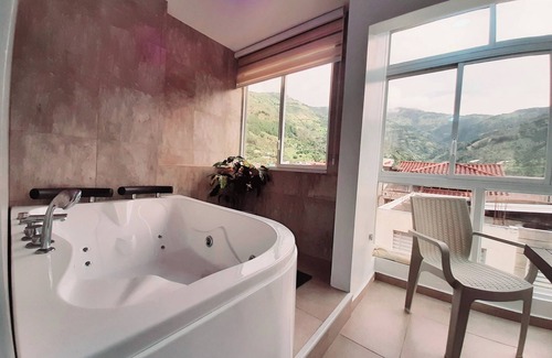 Banos de Agua Santa Apartment | SUITE EDEN CON JACUZZI