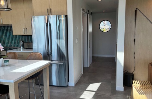 West Sound House | Summer Daze - enjoy in/outdoor living in this new ocean front designer home.