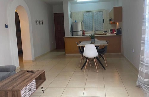 Universal Apartment | Sunlit Comfort in Paphos : Cozy, Family-Friendly 3-BR Apartment Near Everything
